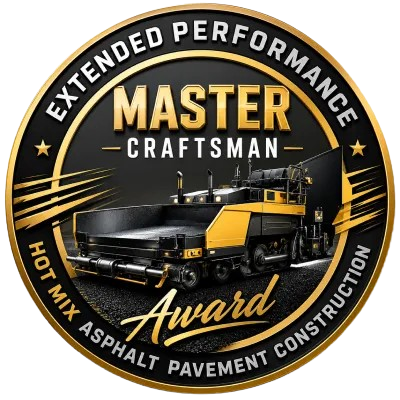 master-1 Gold badge with a black and yellow paving machine, text reads “Master Craftsman Award Hot Mix Asphalt Pavement Construction.”.